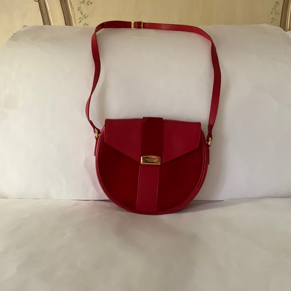 Paris red leather and suede,  L9 inch D  x  D 7 1/2 inch.   x. W 2 in